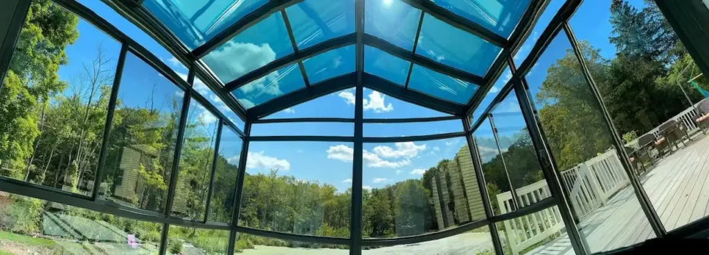 Glass sunroom with panoramic views